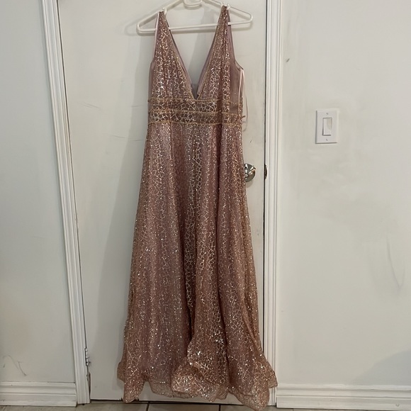 Sparkly pink dress with a mesh covered neckline. - Picture 2 of 2